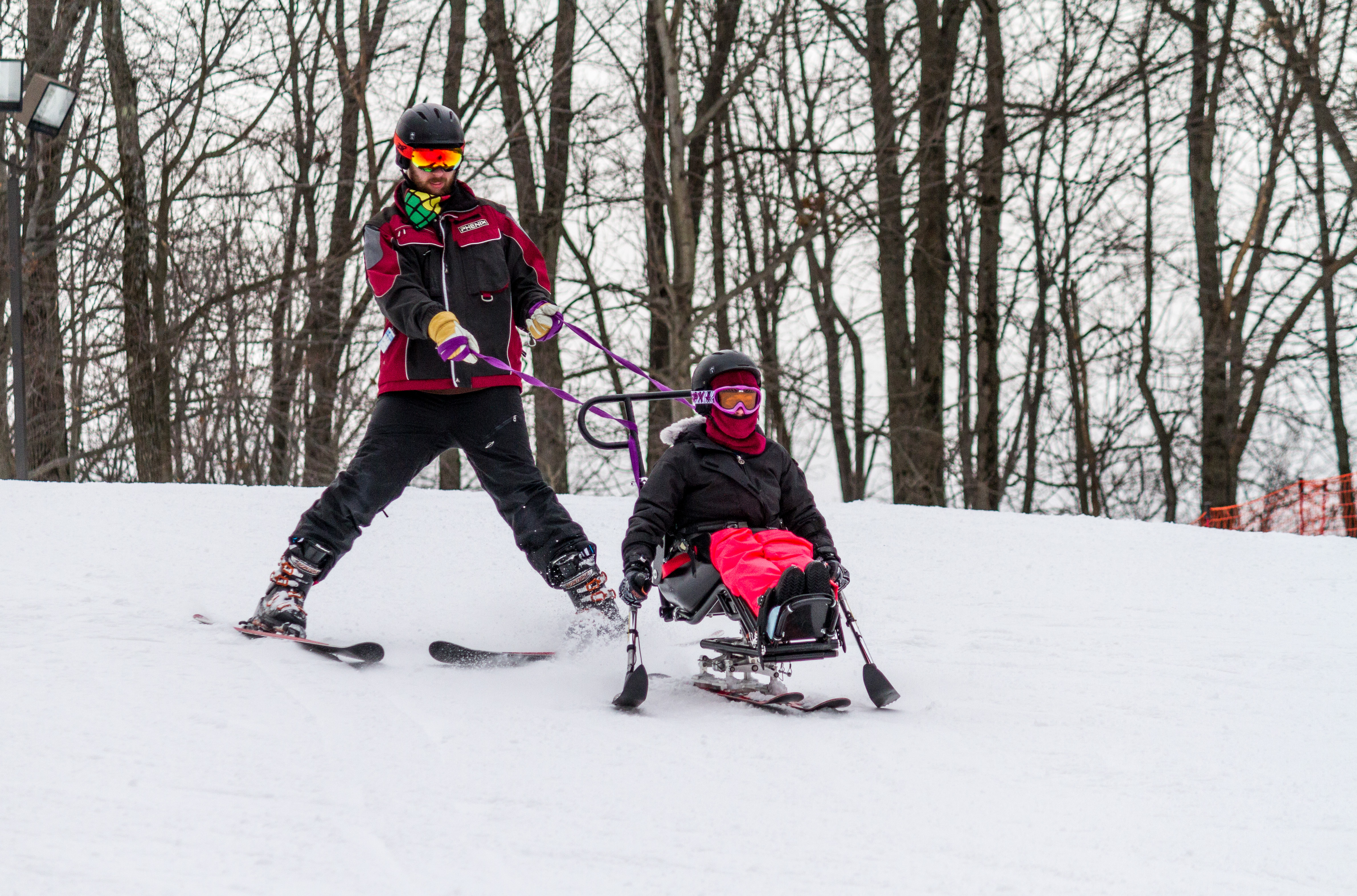 Amazing adaptive skiing (sit ski, mono ski) at The Hartford Ski Spectacular  - Disabled Sports USA 